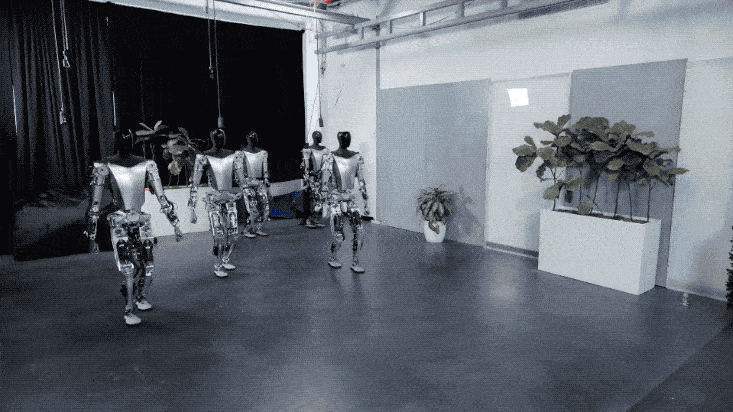 特斯拉人形机器人集体出街！马斯克：比车便宜，会有100亿台