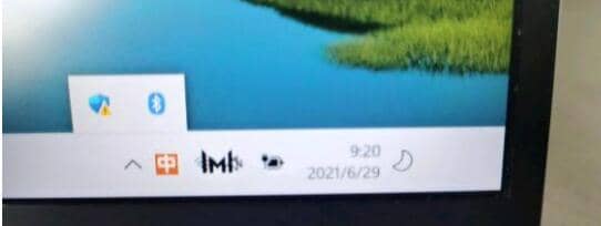 win11任务栏右侧图标重叠怎么办？
